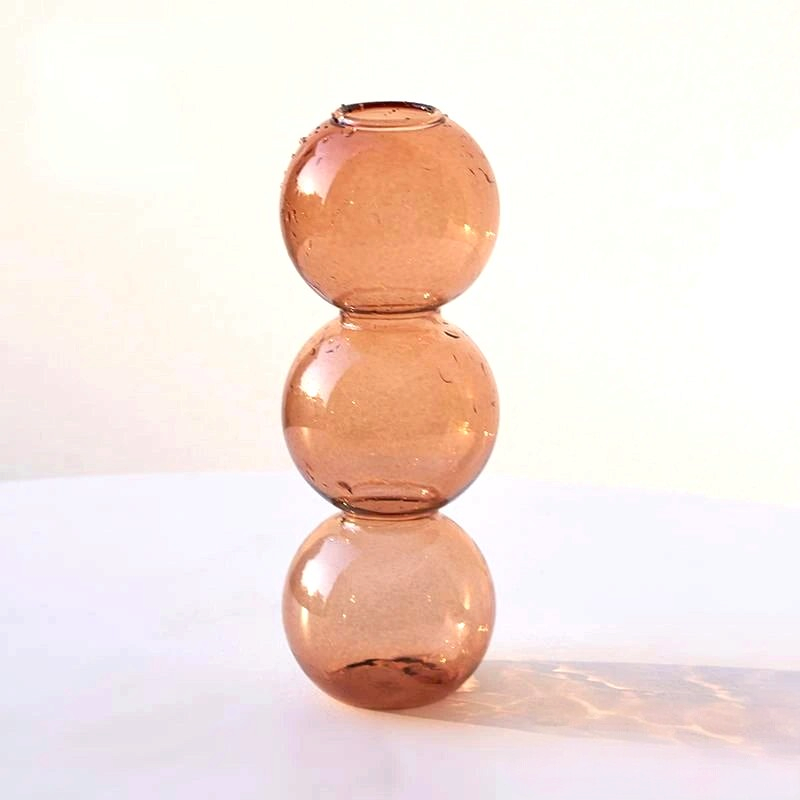 By Levin Nordic Bubble glass flower vase in a warm brown tone with a stacked sphere design for modern home decor.