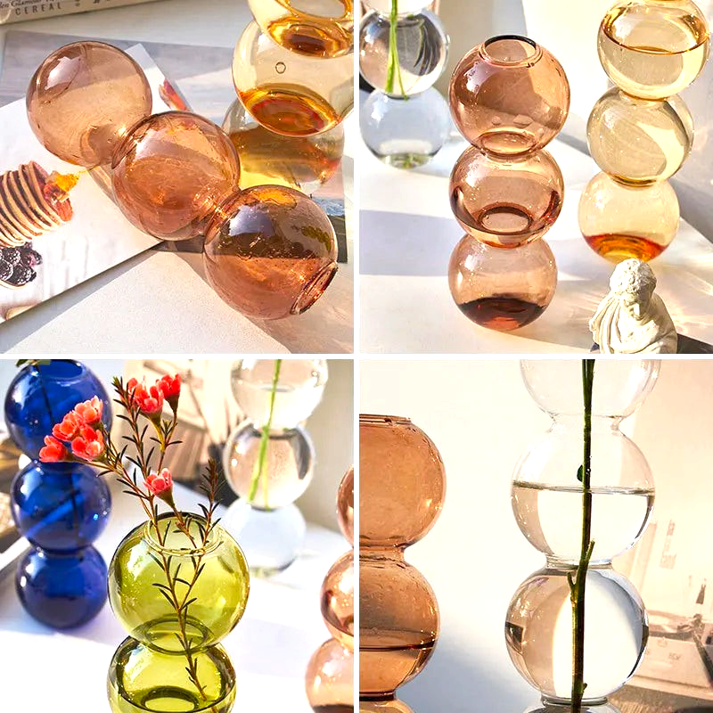 By Levin Nordic Bubble glass flower vases in various colors with a stacked sphere design for modern home decor.