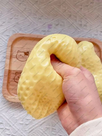 Krakende Pinda Squishy - Boterzachte ASMR Anti-Stress Fidget Bal