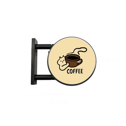 By Levin LED coffee shop sign fridge magnet featuring a cute cat illustration with a cup of coffee on a round board.